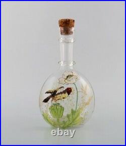 Legras, France. Carafe with hand painted enamel decoration in art glass, 1890s